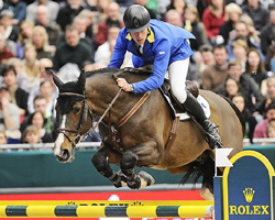 Christian Ahlmann - jetzt in der Jacke des Gestüts Zangersheide und hier mit Lucky Lord - hat das Weltcup Springen in Leipzig mit dem Hengst Taloubet Z gewonnen. Foto: Wego